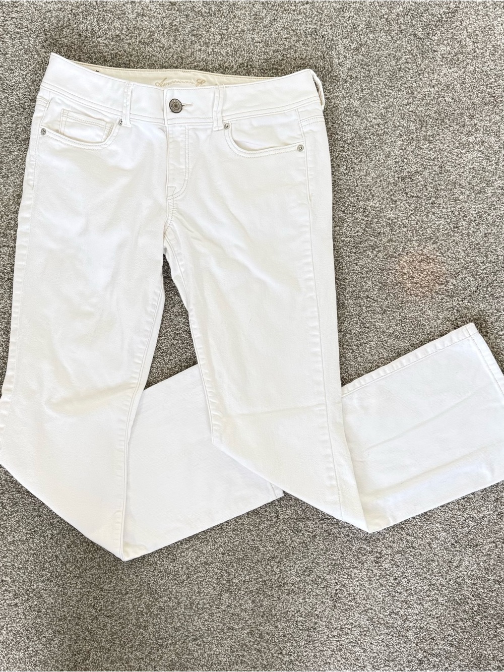 American Eagle Low Rise Boot Cut White Denim Jeans